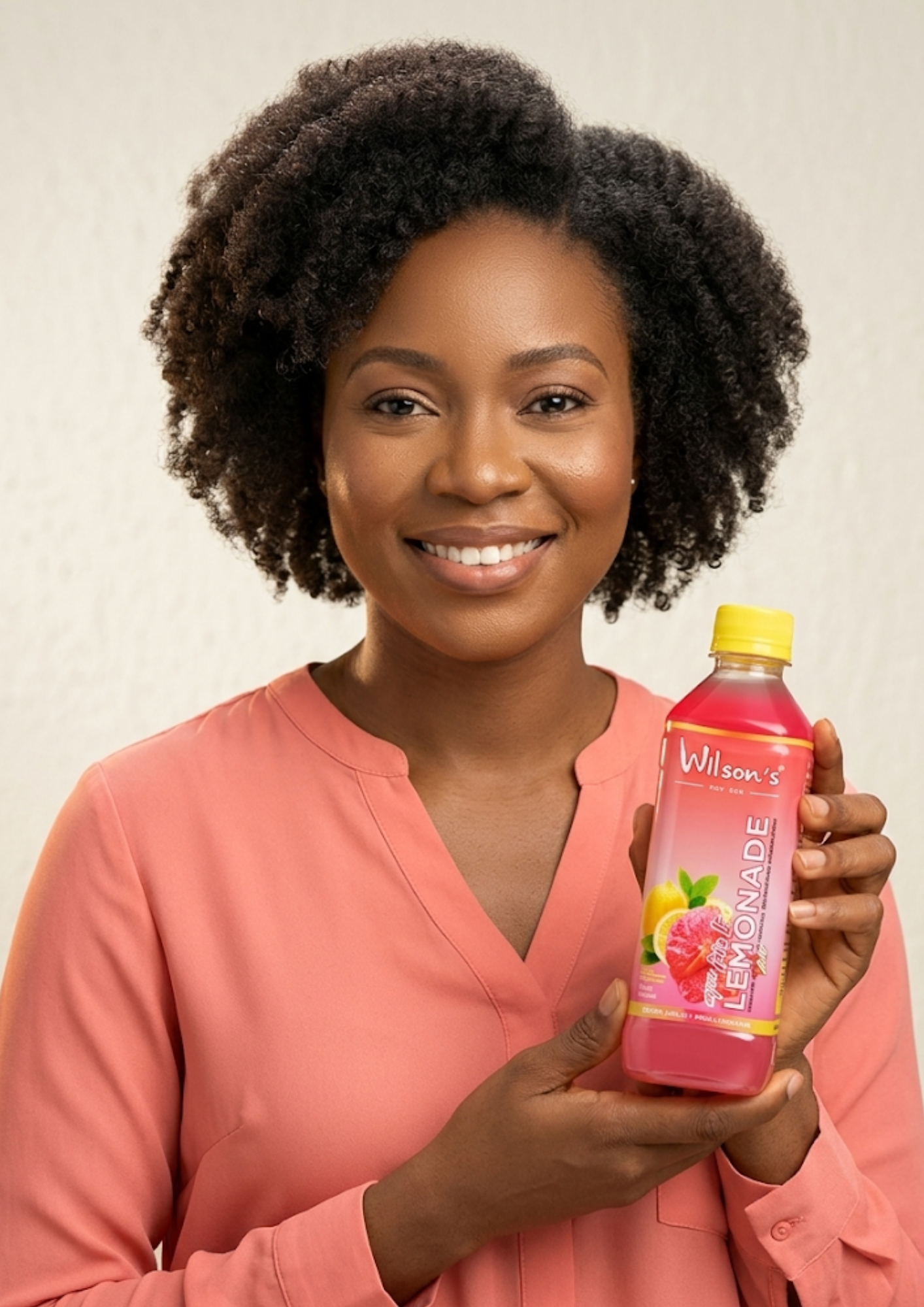 Wilson's Lemonade - Happy customer holding product